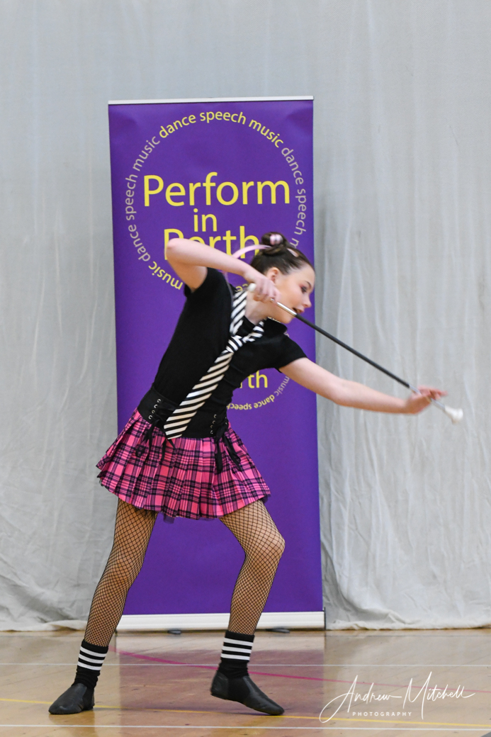 Performers show their sparkle as their batons twirl